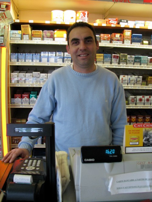 Stephane at the till of his "bar tabac" in the village of Bruère Allichamps in the very centre of France.